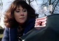 [Sarah Jane Smith with K9 Mark III.]