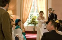 [The Doctor interrupts Sarah Jane's wedding.]